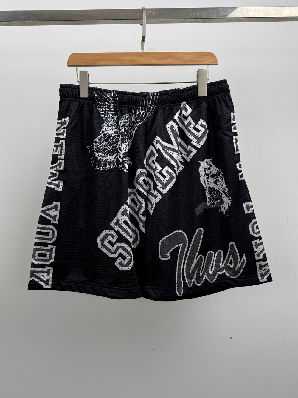 Supreme Black Athletic Shorts with White Graphics